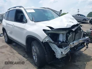 2023 Honda Passport TrailSport with VIN 5FNYF8H62PB043341, listed as a IAAI auction lot 42410337 with 20,695 mi miles and . Bid and sale history available at DreamBid. Image 1.