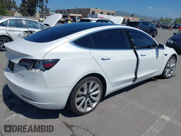 2020 Tesla Model 3 Long Range z VIN 5YJ3E1EB3LF621348, wystawiony jako IAAI lot #42121895 z przebiegiem Nie podano mil oraz . Historia ofert i sprzedaży dostępna na DreamBid. Obrazek 4.