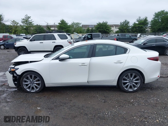 2021 Mazda 3 Preferred z VIN 3MZBPBCL0MM250862, wystawiony jako IAAI lot #42318612 z przebiegiem 86 056 mil mil oraz . Historia ofert i sprzedaży dostępna na DreamBid. Obrazek 14.