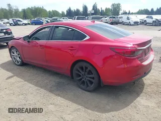 2016 Mazda 6 i Grand Touring с VIN JM1GJ1W52G1403034, выставлен на аукционе IAAI как лот 42238556 с пробегом 141 470 миль миль и . История ставок и продаж доступна на DreamBid. Изображение 3.