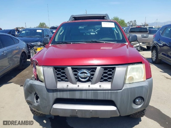 2005 Nissan Xterra S with VIN 5N1AN08U35C616998, listed as a IAAI auction lot 41954338 with 136,126 mi miles. Bid and sale history available at carsss.com. Image 12.