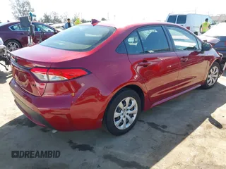 2022 Toyota Corolla LE with VIN JTDEPMAE3NJ232547, listed as a IAAI auction lot 41719602 with 22,071 mi miles. Bid and sale history available at carsss.com. Image 4.
