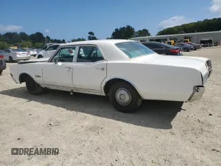 1967 Oldsmobile Cutlass with VIN 336697G151477, listed as a Copart auction lot 71653824 with 974,235 mi miles and Clean Title. Bid and sale history available at DreamBid. Image 2.