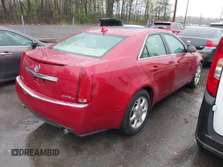 2009 Cadillac CTS AWD w/1SB with VIN 1G6DS57V490128140, listed as a IAAI auction lot 42001773 with 95,597 mi miles. Bid and sale history available at carsss.com. Image 4.