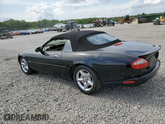 1999 Jaguar XK z VIN SAJGX2044XC031383, wystawiony jako Copart lot #54726925 z przebiegiem 107 696 mil mil oraz Szkody całkowita. Historia ofert i sprzedaży dostępna na DreamBid. Obrazek 2.