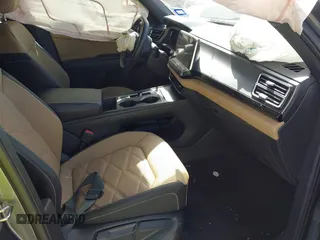 2024 Volkswagen Atlas SE z VIN 1V2DE2CA8RC202274, wystawiony jako IAAI lot #41864958 z przebiegiem 32 957 mil mil oraz . Historia ofert i sprzedaży dostępna na DreamBid. Obrazek 5.