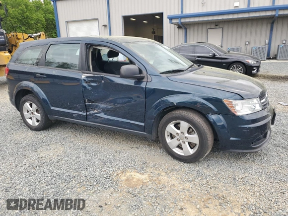 2013 Dodge Journey American Value with VIN 3C4PDCAB6DT577273, listed as a Copart auction lot 50627295 with 139,775 mi miles and Salvage title. Bid and sale history available at DreamBid. Image 4.