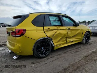 2016 BMW X5 M z VIN 5YMKT6C51G0R77692, wystawiony jako Copart lot #81979013 z przebiegiem 56 774 mil mil oraz . Historia ofert i sprzedaży dostępna na DreamBid. Obrazek 3.