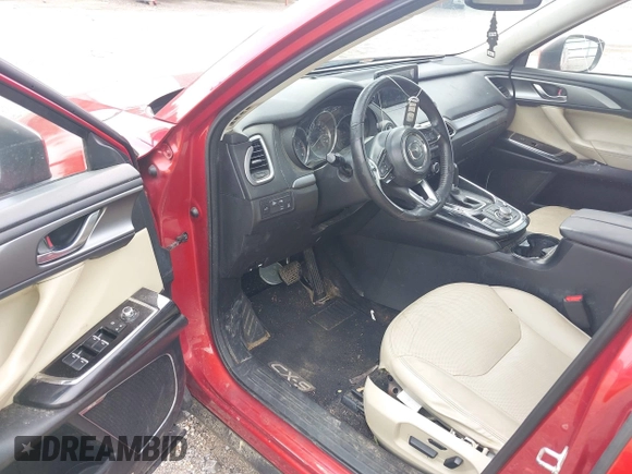 2016 Mazda CX-9 Touring z VIN JM3TCACY0G0101617, wystawiony jako IAAI lot #41850485 z przebiegiem 292 880 mil mil oraz . Historia ofert i sprzedaży dostępna na DreamBid. Obrazek 20.
