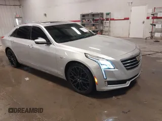 2016 Cadillac CT6 Luxury AWD with VIN 1G6KD5RS1GU153118, listed as a IAAI auction lot 41821531 with 90,401 mi miles. Bid and sale history available at carsss.com. Image 1.