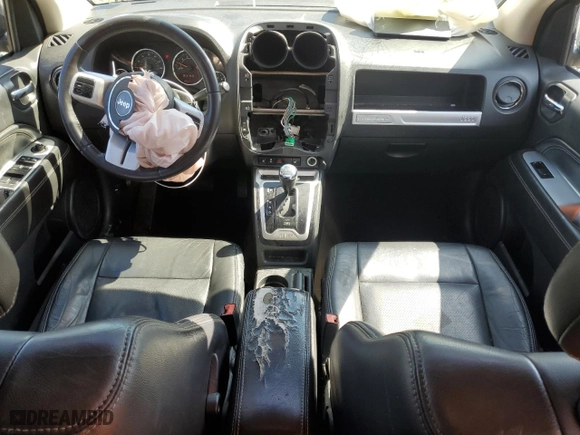 2017 Jeep Compass High Altitude with VIN 1C4NJCEA7HD125880, listed as a Copart auction lot 49104925 with 99,779 mi miles and Salvage Title. Bid and sale history available at carsss.com. Image 8.