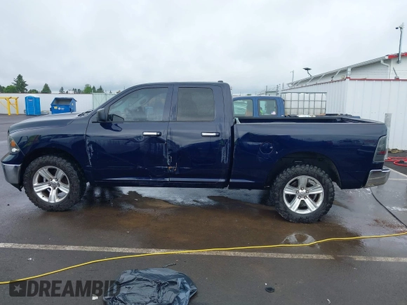 2015 Ram 1500 Outdoorsman z VIN 1C6RR7GT6FS508211, wystawiony jako IAAI lot #42044889 z przebiegiem 125 774 mil mil oraz . Historia ofert i sprzedaży dostępna na DreamBid. Obrazek 14.