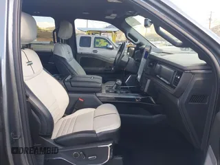 2023 Ford F-150 Lightning Pro with VIN 1FT6W1EV8PWG25191, listed as a IAAI auction lot 41716529 with 5,191 mi miles and . Bid and sale history available at DreamBid. Image 5.