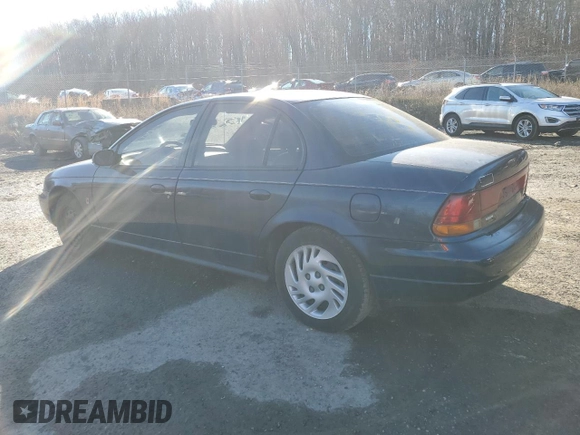 1999 Saturn SL with VIN 1G8ZK5270XZ184042, listed as a Copart auction lot 86827254 with Not Provided miles and Salvage Title. Bid and sale history available at carsss.com. Image 2.