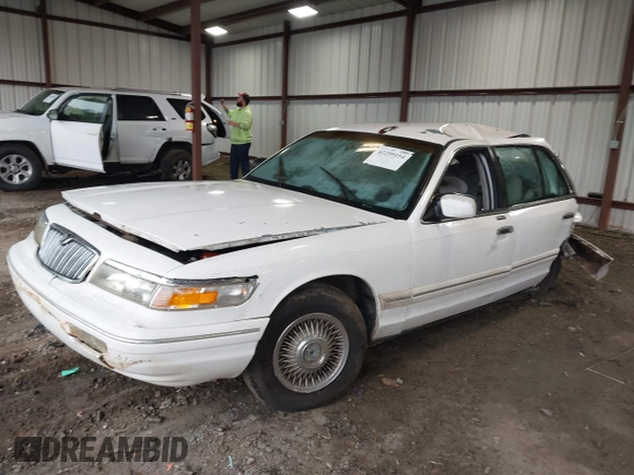 1997 Mercury Grand Marquis GS z VIN 2MELM74W6VX680292, wystawiony jako IAAI lot #42299154 z przebiegiem 208 666 mil mil oraz . Historia ofert i sprzedaży dostępna na DreamBid. Obrazek 16.