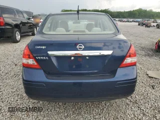 2009 Nissan Versa S with VIN 3N1BC11E19L433572, listed as a Copart auction lot 54084215 with 144,178 mi miles and Salvage title. Bid and sale history available at DreamBid. Image 6.