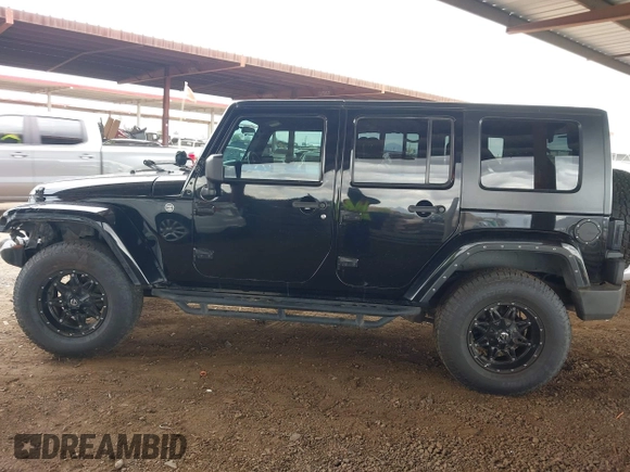 2008 Jeep Wrangler Unlimited Sahara with VIN 1J8GA59128L542384, listed as a IAAI auction lot 42184176 with 152,768 mi miles and . Bid and sale history available at DreamBid. Image 14.