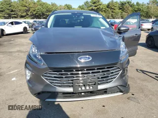2021 Ford Escape Titanium Plug-In Hybrid z VIN 1FMCU0LZ1MUB17737, wystawiony jako Copart lot #57162592 z przebiegiem Nie podano mil oraz . Historia ofert i sprzedaży dostępna na DreamBid. Obrazek 7.
