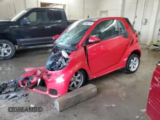 2015 Smart fortwo Passion z VIN WMEEJ3BA8FK800862, wystawiony jako Copart lot #60432765 z przebiegiem 60 146 mil mil oraz Szkoda całkowita • Salvage title. Historia ofert i sprzedaży dostępna na DreamBid. Obrazek 1.