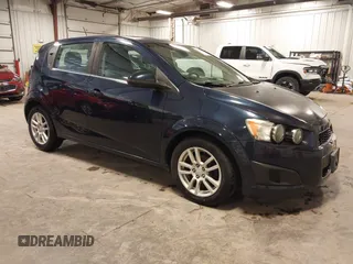 2015 Chevrolet Sonic LT with VIN 1G1JC6SB2F4129090, listed as a IAAI auction lot 42615917 with 98,704 mi miles and . Bid and sale history available at DreamBid. Image 1.