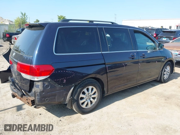 2008 Honda Odyssey EX with VIN 5FNRL38478B078862, listed as a IAAI auction lot 40090252 with 184,583 mi miles. Bid and sale history available at carsss.com. Image 4.