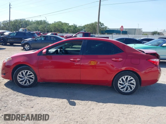 2018 Toyota Corolla L z VIN 2T1BURHE1JC011808, wystawiony jako IAAI lot #42289116 z przebiegiem 124 379 mil mil oraz . Historia ofert i sprzedaży dostępna na DreamBid. Obrazek 14.