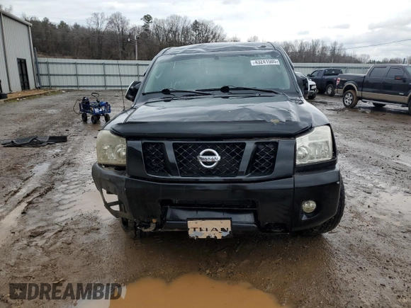 2011 Nissan Titan Pro-4X z VIN 1N6BA0EC2BN325891, wystawiony jako Copart lot #43241505 z przebiegiem Nie podano mil oraz Szkoda całkowita • Salvage title. Historia ofert i sprzedaży dostępna na DreamBid. Obrazek 5.