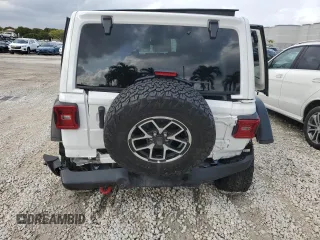 2024 Jeep Wrangler Rubicon with VIN 1C4PJXFG7RW247535, listed as a Copart auction lot 41755145 with 2,072 mi miles and Salvage title. Bid and sale history available at DreamBid. Image 6.