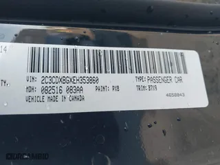 2014 Dodge Charger SE with VIN 2C3CDXBGXEH353860, listed as a IAAI auction lot 41819065 with 158,774 mi miles. Bid and sale history available at carsss.com. Image 9.