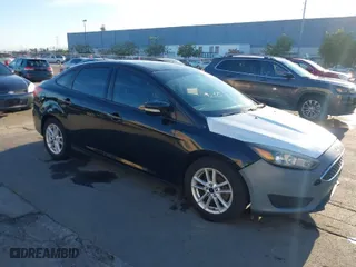 2015 Ford Focus SE with VIN 1FADP3F29FL350473, listed as a IAAI auction lot 41032182 with 102,898 mi miles. Bid and sale history available at carsss.com. Image 1.