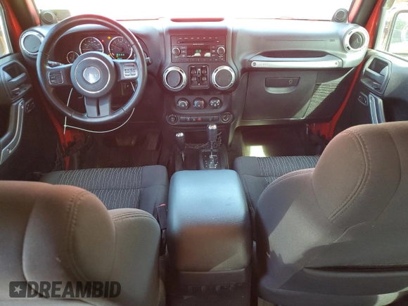 2012 Jeep Wrangler Unlimited Sahara with VIN 1C4BJWEG0CL128417, listed as a Copart auction lot 56243815 with 95,635 mi miles and Salvage title. Bid and sale history available at DreamBid. Image 8.