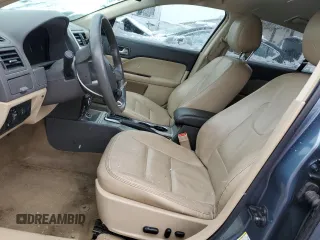 2012 Ford Fusion SEL z VIN 3FAHP0JA7CR300456, wystawiony jako Copart lot #44750125 z przebiegiem 144 788 mil mil oraz Szkoda całkowita • Salvage title. Historia ofert i sprzedaży dostępna na DreamBid. Obrazek 7.