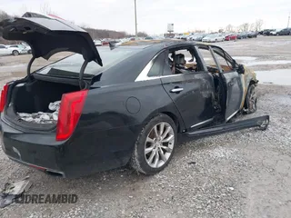 2016 Cadillac XTS Luxury Collection with VIN 2G61N5S33G9140637, listed as a IAAI auction lot 41067574 with Not Provided miles and . Bid and sale history available at DreamBid. Image 4.