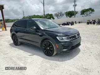 2021 Volkswagen Tiguan SE with VIN 3VV3B7AX4MM095257, listed as a Copart auction lot 60690015 with 61,782 mi miles and Salvage title. Bid and sale history available at DreamBid. Image 14.