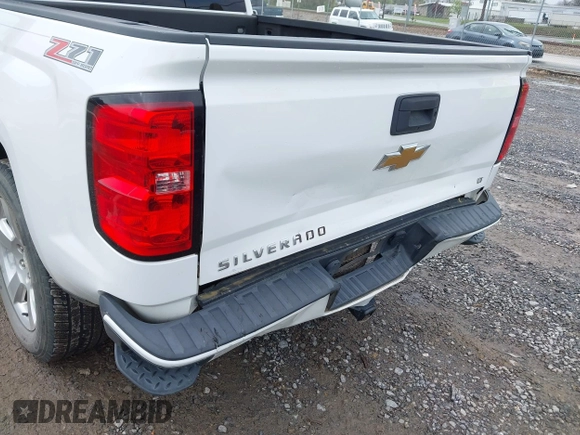 2016 Chevrolet Silverado 1500 LT with VIN 3GCUKREC0GG136136, listed as a IAAI auction lot 41971199 with 179,045 mi miles and . Bid and sale history available at DreamBid. Image 6.