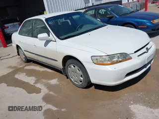 1999 Honda Accord LX with VIN JHMCG5646XC004545, listed as a IAAI auction lot 42185448 with 189,913 mi miles and . Bid and sale history available at DreamBid. Image 1.