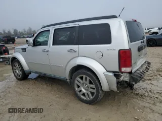 2011 Dodge Nitro Heat with VIN 1D4PU4GXXBW585461, listed as a Copart auction lot 85256984 with 145,585 mi miles and Salvage Title. Bid and sale history available at carsss.com. Image 2.