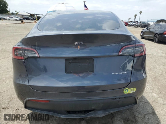2023 Tesla Model Y Long Range with VIN 7SAYGDEE4PF899390, listed as a Copart auction lot 54361685 with Not Provided miles and Clean Title. Bid and sale history available at DreamBid. Image 6.