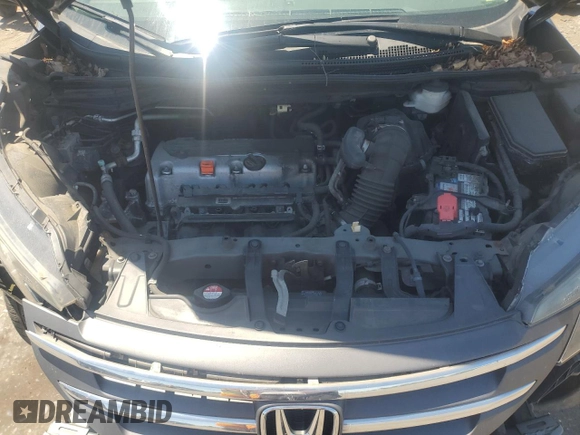 2013 Honda CR-V EX-L z VIN 2HKRM4H7XDH628094, wystawiony jako Copart lot #57358245 z przebiegiem 123 505 mil mil oraz Szkody całkowita. Historia ofert i sprzedaży dostępna na DreamBid. Obrazek 12.