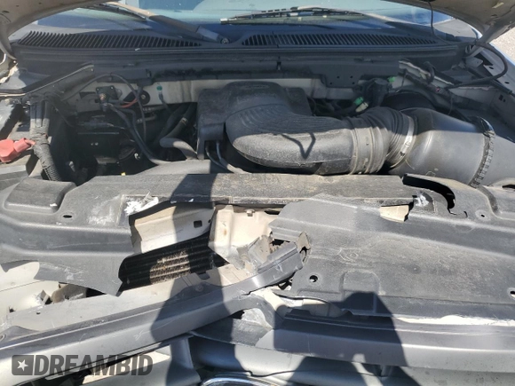 2004 Ford F-150 XL with VIN 2FTRX17W24CA52991, listed as a Copart auction lot 55853095 with 221,452 mi miles and Salvage title. Bid and sale history available at DreamBid. Image 11.
