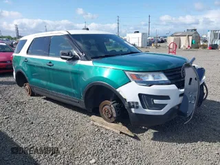 2017 Ford Police Interceptor Utility z VIN 1FM5K8AT5HGA24624, wystawiony jako IAAI lot #39467260 z przebiegiem 148 823 mil mil oraz . Historia ofert i sprzedaży dostępna na DreamBid. Obrazek 1.