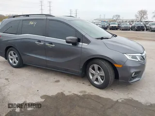 2018 Honda Odyssey EX-L with VIN 5FNRL6H72JB076597, listed as a IAAI auction lot 41838664 with 154,647 mi miles and . Bid and sale history available at DreamBid. Image 1.