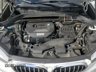 2017 BMW X1 sDrive28i with VIN WBXHU7C33H5H32827, listed as a Copart auction lot 50348265 with 117,412 mi miles and Salvage Title. Bid and sale history available at carsss.com. Image 13.