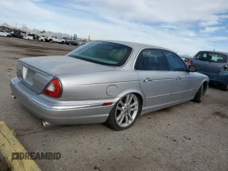2004 Jaguar XJ with VIN SAJWA73B14TG24590, listed as a Copart auction lot 48438705 with 197,113 mi miles and Clean Title. Bid and sale history available at carsss.com. Image 3.
