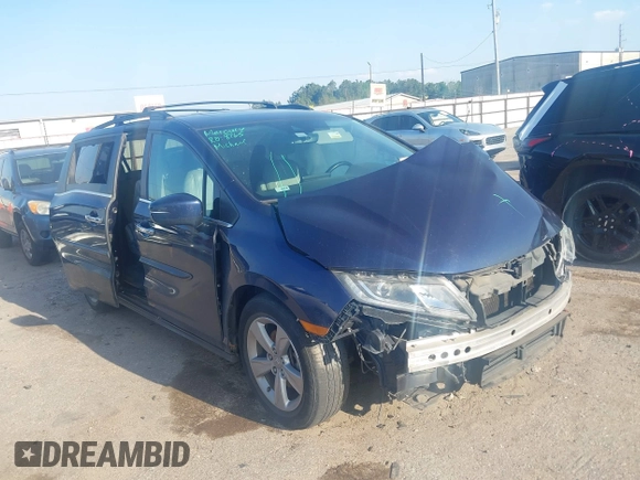 2019 Honda Odyssey EX-L with VIN 5FNRL6H75KB054465, listed as a IAAI auction lot 41841488 with 141,790 mi miles. Bid and sale history available at carsss.com. Image 1.