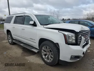 2017 GMC Yukon XL SLE with VIN 1GKS2FKC2HR215016, listed as a Copart auction lot 49651765 with 144,603 mi miles and Salvage Title. Bid and sale history available at carsss.com. Image 4.