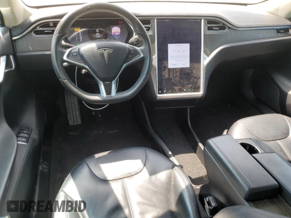 2013 Tesla Model S with VIN 5YJSA1AG9DFP04910, listed as a Copart auction lot 60827335 with 97,022 mi miles and Salvage title. Bid and sale history available at DreamBid. Image 8.