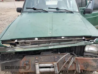 1996 Jeep Cherokee SE with VIN 1J4FT28S5TL244548, listed as a Copart auction lot 68908934 with 182,507 mi miles and Salvage Title. Bid and sale history available at carsss.com. Image 13.