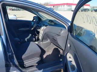 2008 Toyota Yaris with VIN JTDBT903184019529, listed as a IAAI auction lot 41801008 with 186,628 mi miles. Bid and sale history available at carsss.com. Image 5.