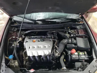 2010 Acura TSX z VIN JH4CU2F61AC007983, wystawiony jako Copart lot #57957275 z przebiegiem 185 236 mil mil oraz Szkody całkowita. Historia ofert i sprzedaży dostępna na DreamBid. Obrazek 11.